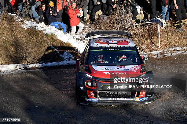 British's driver Chris Meeke and his co-pilot Paul nagle steer their Citroen C3 on January 18, 2017 in Gap, southeastern France, during the shakedown...