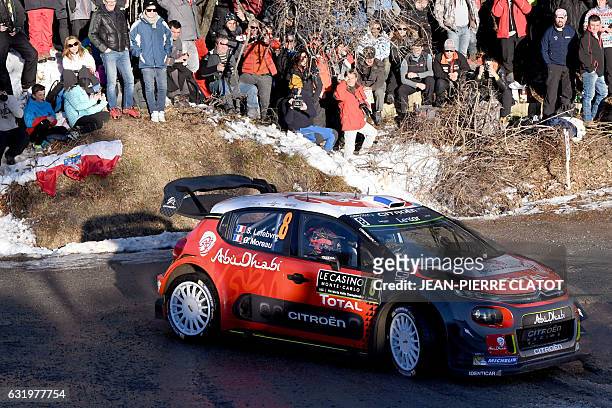 French's driver Stephane Lefebvre and his co-pilot Gabin Moreau steer their Citroen C3 on January 18, 2017 in Gap, southeastern France, during the...