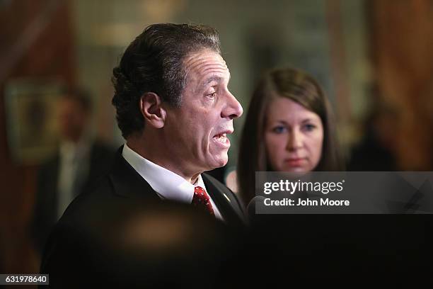 New York Governor Andrew Cuomo speaks to the media after meeting with President-elect Donald Trump on January 18, 2017 at Trump Tower in New York...