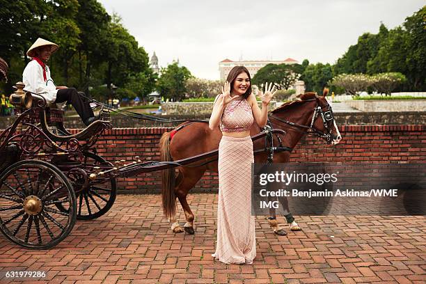 Miss Universe Kazakhstan, Darina Kulsitova wears a gown by designer Sherri Hill while visiting Fort Santiago on January 16, 2017 in Manila, the...