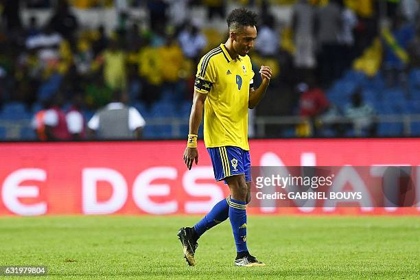Gabon's forward Pierre-Emerick Aubameyang walks off the pitch at the end of the 2017 Africa Cup of Nations group A football match between Gabon and...