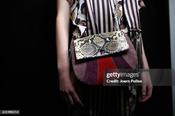 Model, bag detail, is seen backstage ahead of the Laurel show during the Mercedes-Benz Fashion Week Berlin A/W 2017 at Kaufhaus Jandorf on January...