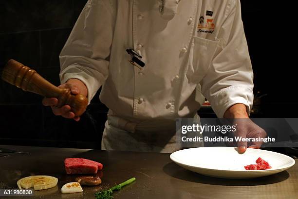 Chef prepares Kobe beef steaks in a Kobe Plaisir restaurant on January 18, 2017 in Kobe, Japan. Kobe city is home to renowned Japanese wagyu beef...