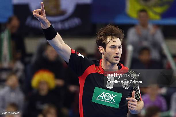 Uwe Gensheimer of Germany celebrates a goal during the 25th IHF Men's World Championship 2017 match between Belarus and Germany at Kindarena on...