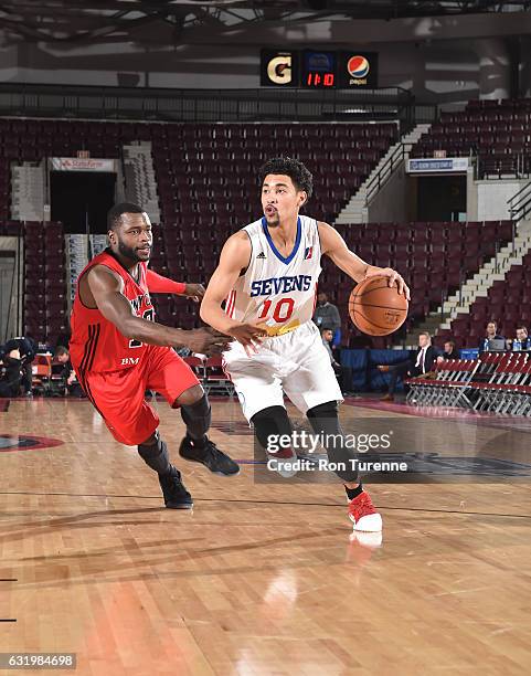 Mikh McKinney of the Windy City Bulls handles the ball against Will Bynum of the Delaware 87ers as part of 2017 NBA D-League Showcase at the Hershey...