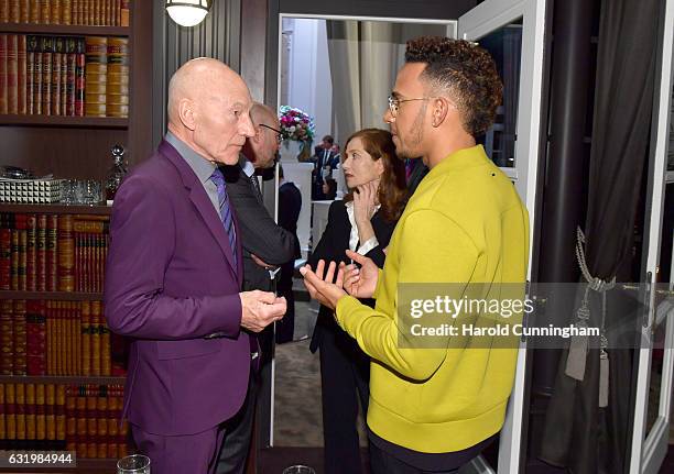 Patrick Stewart and Lewis Hamilton visit the IWC booth during the launch of the Da Vinci Novelties from the Swiss luxury watch manufacturer IWC...