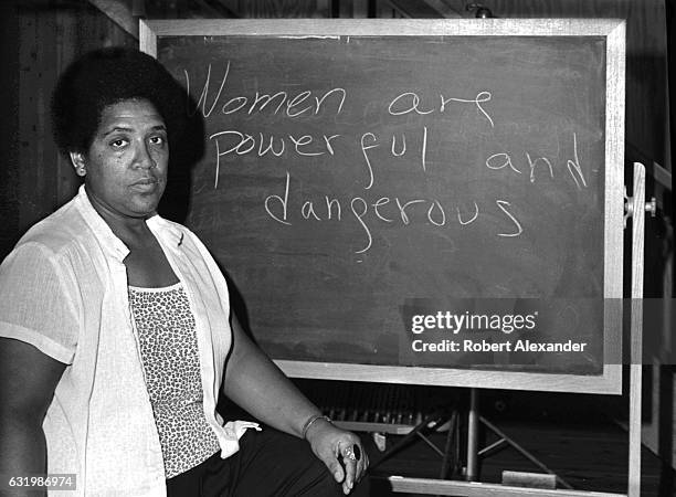 African-American writer, feminist, poet and civil-rights activist Audre Lorde poses for a photograph during her 1983 residency at the Atlantic Center...