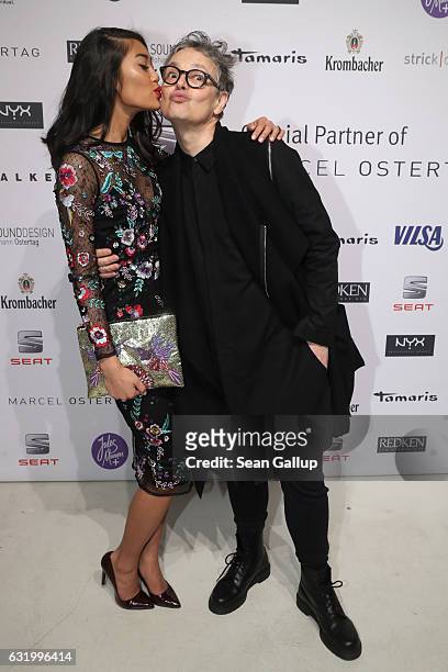 Anuthida Ploypetch and Rolf Scheider attend the Marcel Ostertag show during the Mercedes-Benz Fashion Week Berlin A/W 2017 at on January 18, 2017 in...