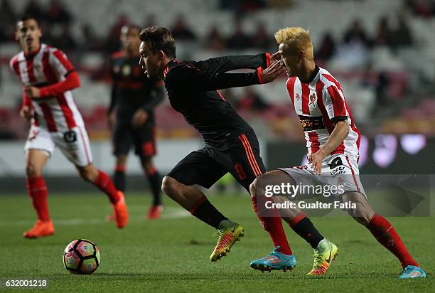 Benfica's midfielder Andre Horta with Leixoes's forward Wei Shihao from China in action during the Portuguese Cup match between SL Benfica and...