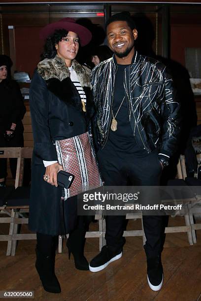 Singer Usher and his wife Grace Miguel attend the Haider Ackermann Menswear Fall/Winter 2017-2018 show as part of Paris Fashion Week. Held at Galerie...