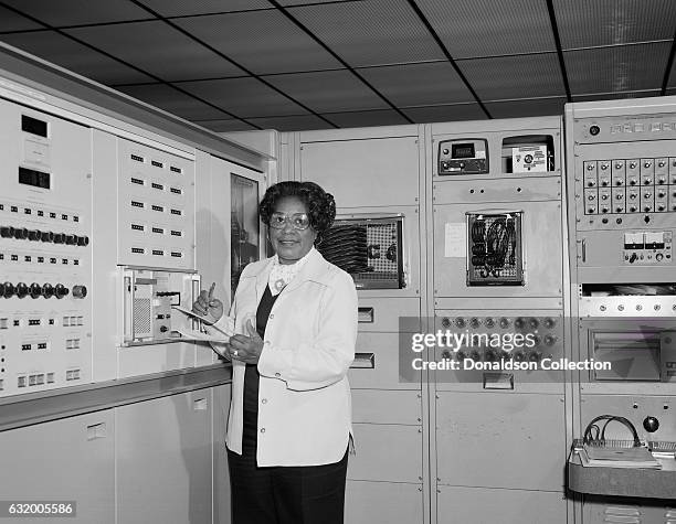 Mathmatician Mary Jackson, the first black woman engineer at NASA poses for a photo at work at NASA Langley Research Center in 1977 in Hampton,...