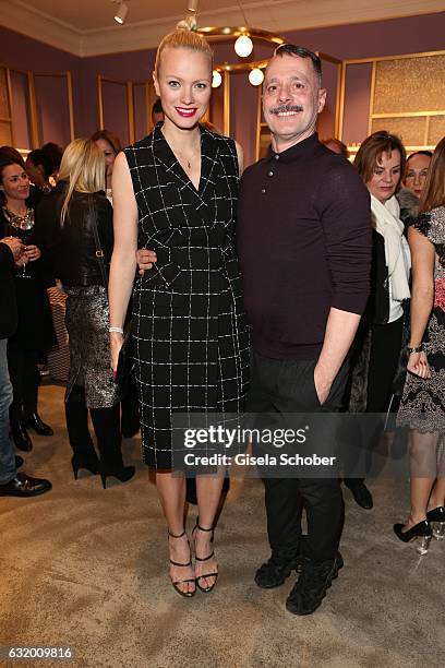 Franziska Knuppe and Designer Johnny Talbot during the Talbot Runhof boutique opening at Schlueterstrasse on January 18, 2017 in Berlin, Germany.