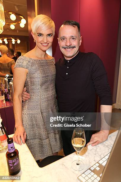 Opera singer Julia Sophie Wagner and Designer Johnny Talbot during the Talbot Runhof boutique opening at Schlueterstrasse on January 18, 2017 in...