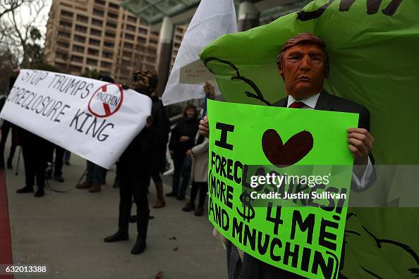 Activists Protest Against Trump's Selection For Treasury Secretary Stephen Mnuchin Activists Protest Against Trump's Selection For Treasury Secretary Stephen Mnuchin