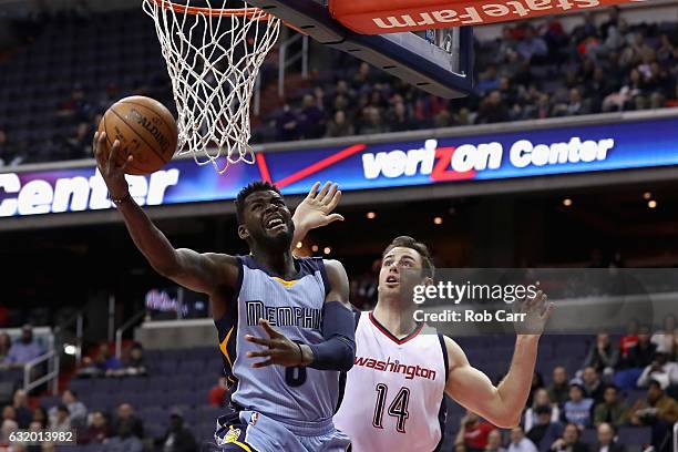 James Ennis of the Memphis Grizzlies puts up a shot in front of Jason Smith of the Washington Wizards at Verizon Center on January 18, 2017 in...