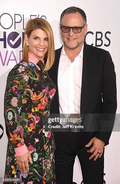 Actors Lori Loughlin and Dave Coulier attend the People's Choice Awards 2017 at Microsoft Theater on January 18, 2017 in Los Angeles, California.