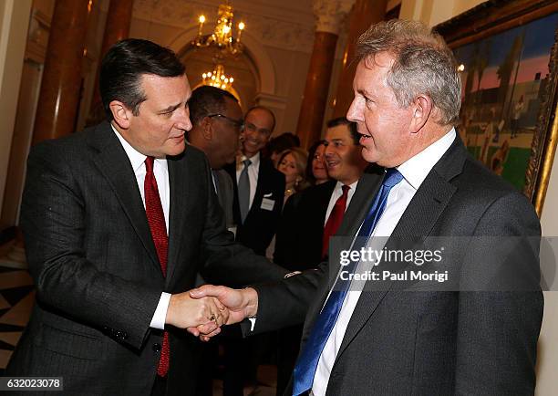 British Ambassador Kim Darroch greets Sen. Ted Cruz at an Afternoon Tea hosted by the British Embassy to mark the U.S. Presidential Inauguration at...