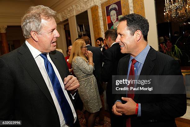 British Ambassador Kim Darroch talks with Fox News Channel TV personality Brian Kilmeade at an Afternoon Tea hosted by the British Embassy to mark...