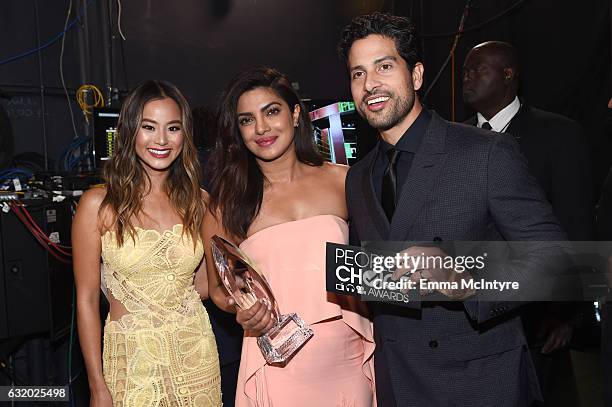 Actress Jamie Chung, actress Priyanka Chopra, winner of the Favorite Dramatic TV Actress award, and actor Adam Rodriguez pose backstage at the...