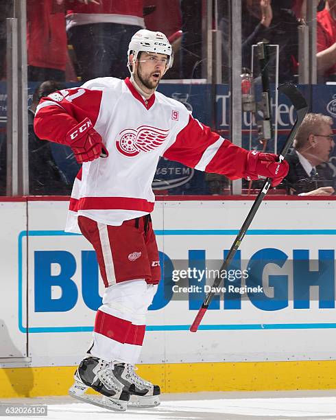 Tomas Tatar of the Detroit Red Wings celebrates his second period goal during an NHL game against the Boston Bruins at Joe Louis Arena on January 18,...