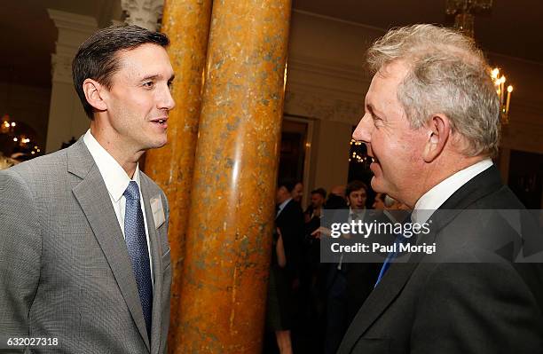 British Ambassador Kim Darroch talks with Thomas Bossert, Assistant to the president for homeland security and counterterrorism, at an Afternoon Tea...