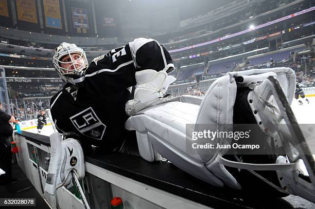 Jeff Zatkoff of the Los Angeles Kings stretches during warm-ups prior to the game against the San Jose Sharks on January 18, 2017 at Staples Center...