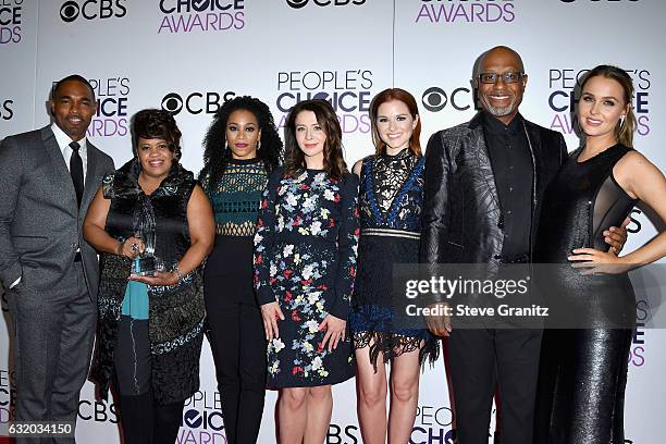 Actors James Pickens Jr., Chandra Wilson, Kelly McCreary, Sarah Drew, Jason George and Camilla Luddington pose with an award in the press room during...