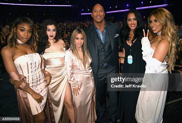 Actor Dwayne Johnson and Simone Alexandra Johnson pose with singers Normani Kordei, Lauren Jauregui, Ally Brooke, and Dinah Jane of Fifth Harmony...