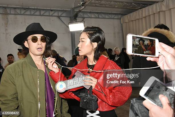 Taiwanese actor Vaness Wu and TV presenter Luoxi Liu attend the Walter Van Beirendonck Menswear Fall/Winter 2017-2018 show as part of the Paris...