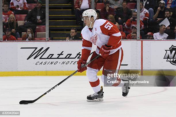 Detroit Red Wings defenseman Alexey Marchenko brings the puck up ice during the NHL hockey game between the Boston Bruins and Detroit Red Wings on...