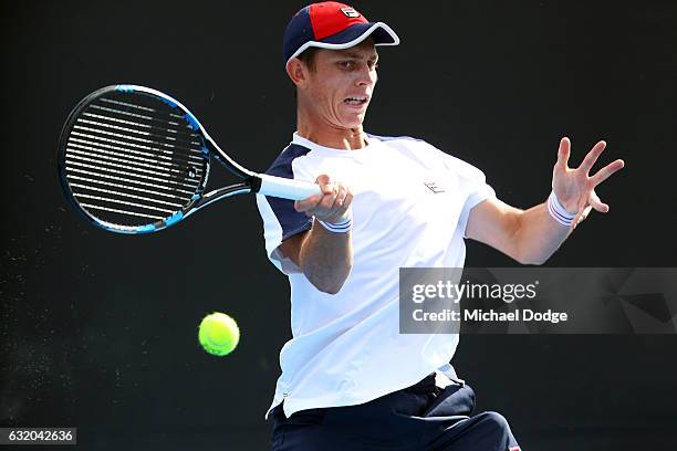 Andrew Whittington of Australia plays a forehand in his second round match against ivo karlovic of Croatia on day four of the 2017 Australian Open at...