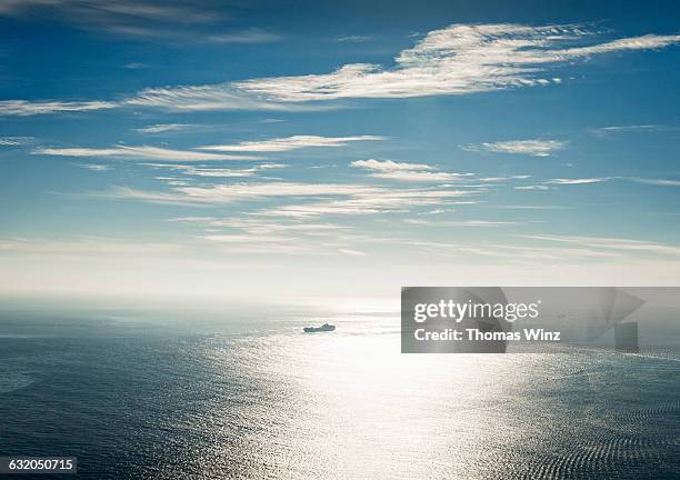 container ships - distant horizon stock pictures, royalty-free photos & images