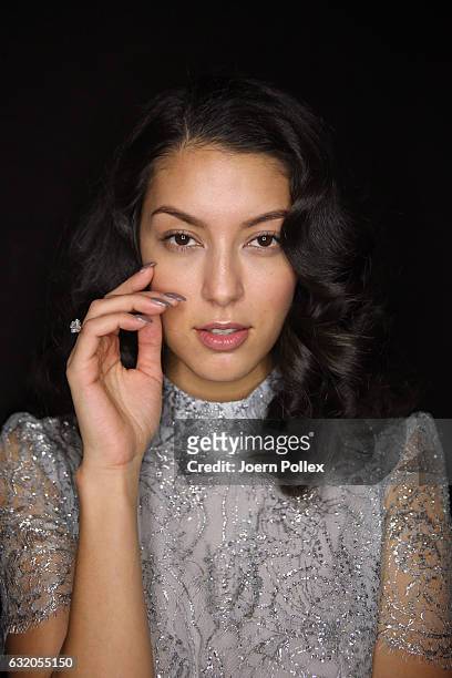 Rebecca Mir is seen backstage ahead of the Ewa Herzog show during the Mercedes-Benz Fashion Week Berlin A/W 2017 at Kaufhaus Jandorf on January 19,...