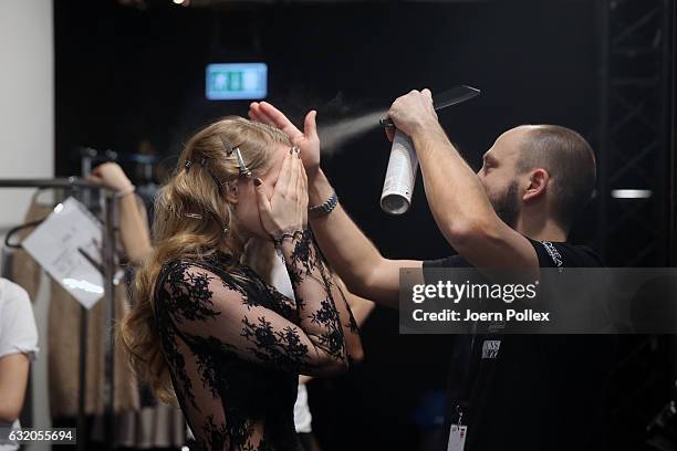 Model is seen backstage ahead of the Ewa Herzog show during the Mercedes-Benz Fashion Week Berlin A/W 2017 at Kaufhaus Jandorf on January 19, 2017 in...