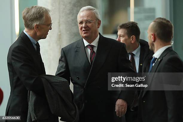 Martin Winterkorn , former CEO of German automaker Volkswagen AG, accompanied by his lawyer Kersten von Schenck , arrives to testify at the Bundestag...