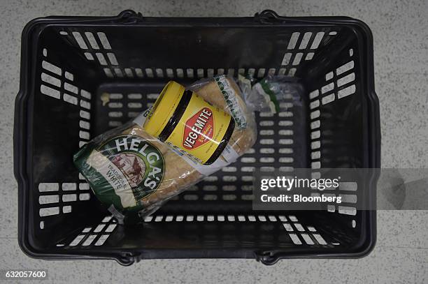 Jar of Vegemite spread is arranged for a photograph in a shopping basket at a grocery store in Melbourne, Australia, on Thursday Jan. 19, 2017. Bega...