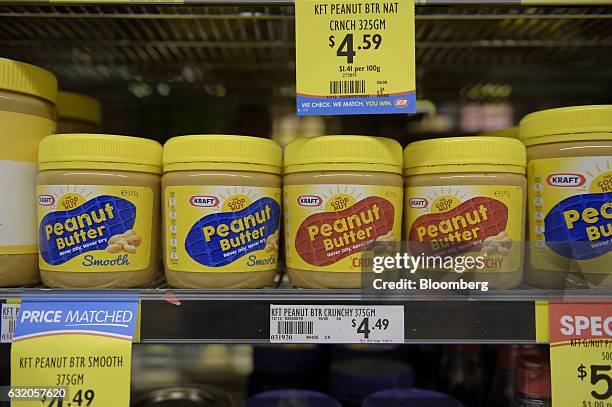 Jars of Kraft Foods Group Inc. Peanut butter spread sit on a shelf at a grocery store in Melbourne, Australia, on Thursday Jan. 19, 2017. Bega Cheese...