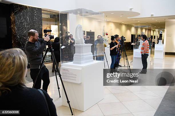 Members of the media interview the artists at the unveiling of the shortlisted artworks for the position on Trafalgar Square's fourth plinth, during...