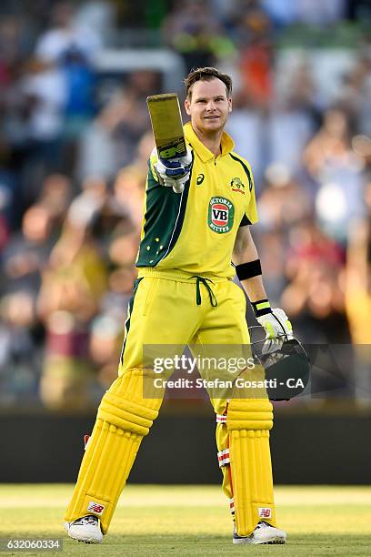 Steve Smith of Australia celebrates his century during game three of the One Day International series between Australia and Pakistan at WACA on...