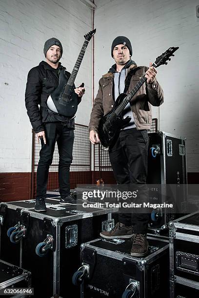 Portrait of Australian musicians Luke Kilpatrick and Jeff Ling of metalcore group Parkway Drive, photographed before a live performance at the O2...