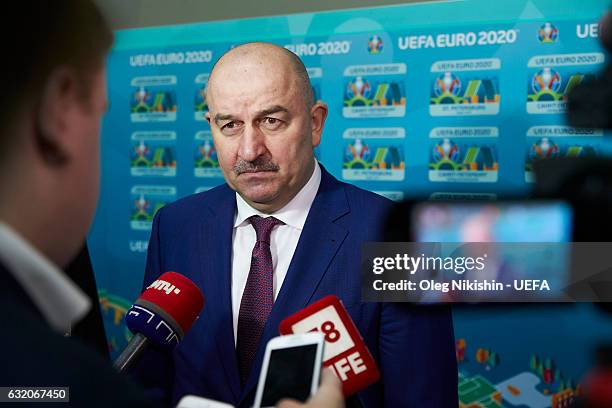 Head Coach of Russia Stanislav Cherchesov speaks during an interview in the flash area during the official EURO 2020 logo presentation for the Manege...