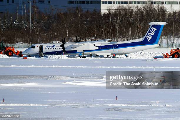 An All Nippon Airways airplane is seen outside the runway at New Chitose Airport on January 19, 2017 in Chitose, Hokkaido, Japan. No injuries...