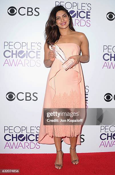 Actress Priyanka Chopra poses in the press room at the People's Choice Awards 2017 at Microsoft Theater on January 18, 2017 in Los Angeles,...