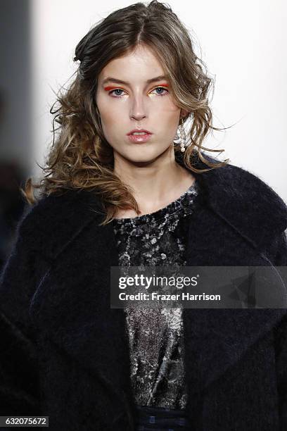 Model walks the runway at the Steinrohner show during the Mercedes-Benz Fashion Week Berlin A/W 2017 at Kaufhaus Jandorf on January 19, 2017 in...