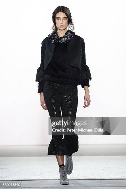 Model walks the runway at the Steinrohner show during the Mercedes-Benz Fashion Week Berlin A/W 2017 at Kaufhaus Jandorf on January 19, 2017 in...