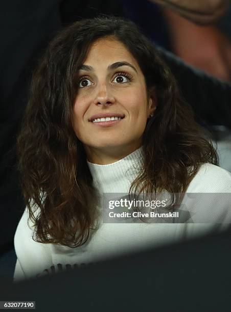 Xisca Perello, girlfriend of Rafael Nadal of Spain watches him play in his second round match against Marcos Baghdatis of Cyprus on day four of the...