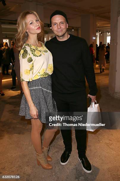 Moguai and Birte Glang attend the Steinrohner show during the Mercedes-Benz Fashion Week Berlin A/W 2017 at Kaufhaus Jandorf on January 19, 2017 in...