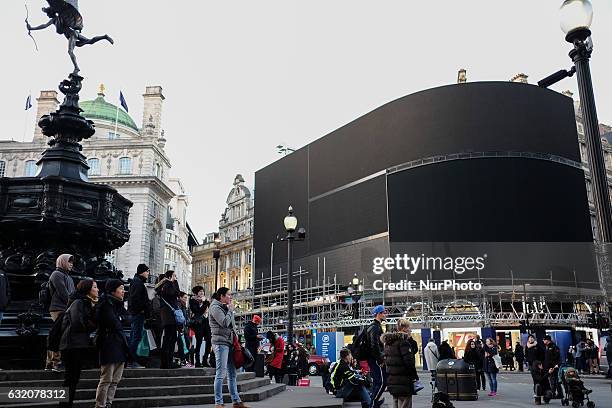 The billboard lights in London's Piccadilly circus have been turned off as work begins on replacing them with LED lights on 19 January 2017.