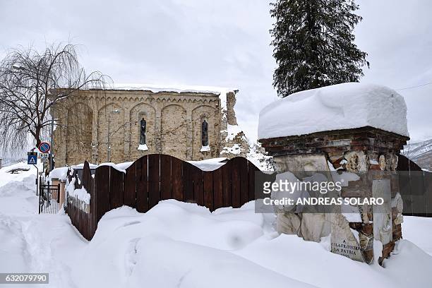 Sant' Agostino church in Amatrice is pictured on January 19, 2017 after a 5.7-magnitude earthquake struck the region. / AFP / ANDREAS SOLARO