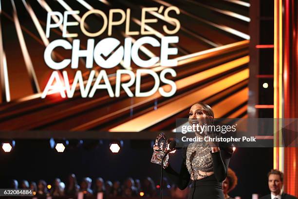 Actress Jennifer Lopez accepts Favorite TV Crime Drama Actress for 'Shades of Blue' onstage during the People's Choice Awards 2017 at Microsoft...